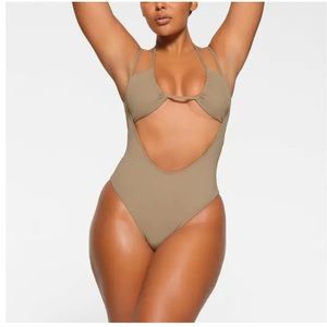 Skims swim cut out open bust one piece